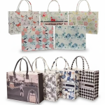 بگ کادویی نمدی فانتزی دسته‌دار طرح‌های گلدار و گرافیکی